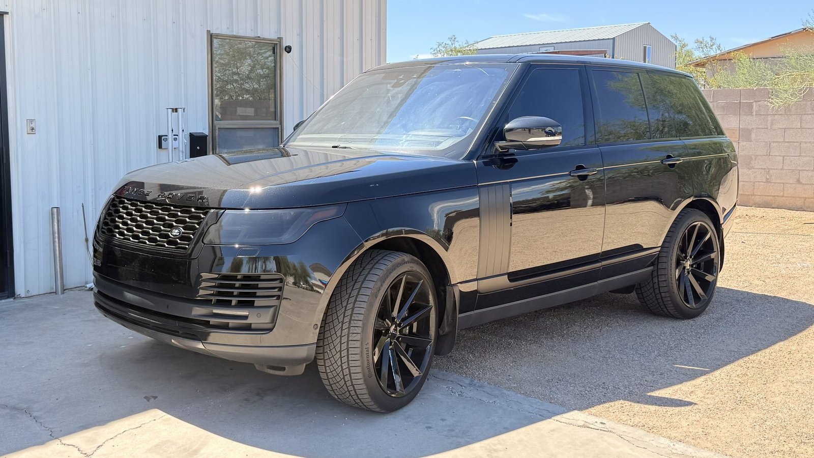 Ceramic coated black Range Rover outside the Elite Auto Spa shop in San Tan Valley, Arizona
