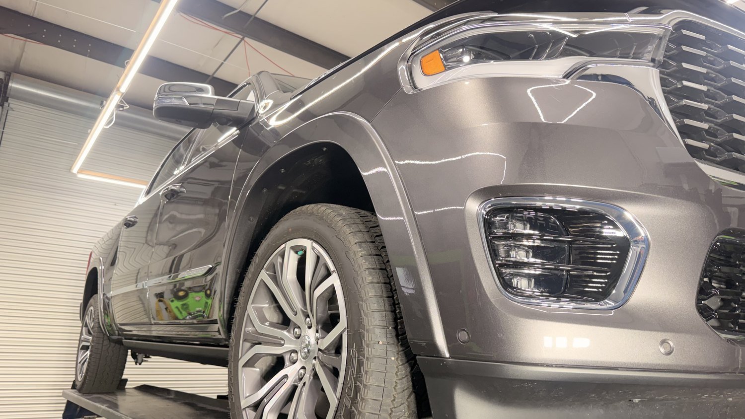 Lower panels and rockers at eye level on the lift at Elite Auto Spa