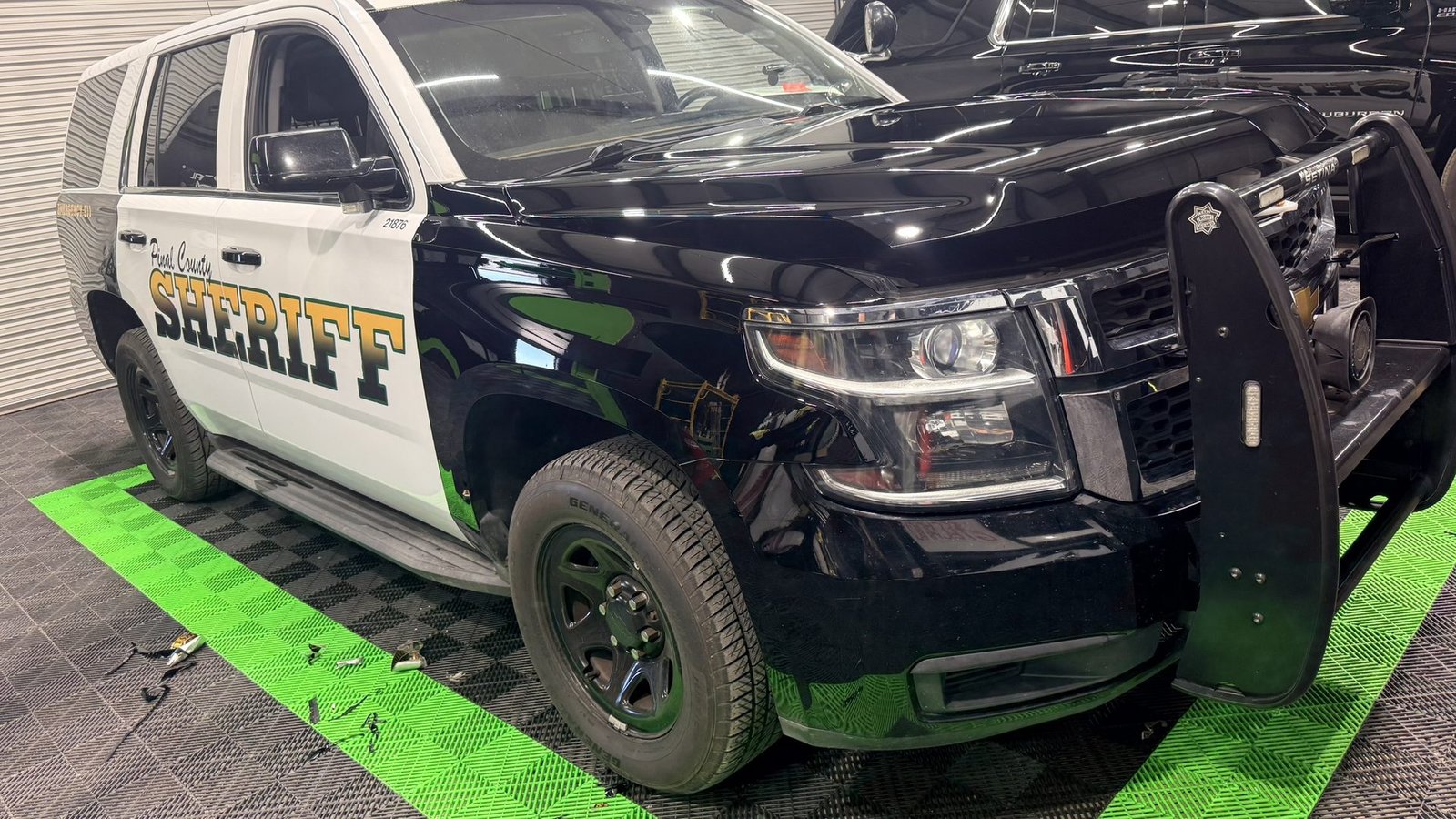 Pinal County Sheriff's Office Tahoe in the Elite Auto Spa shop in San Tan Valley, Arizona