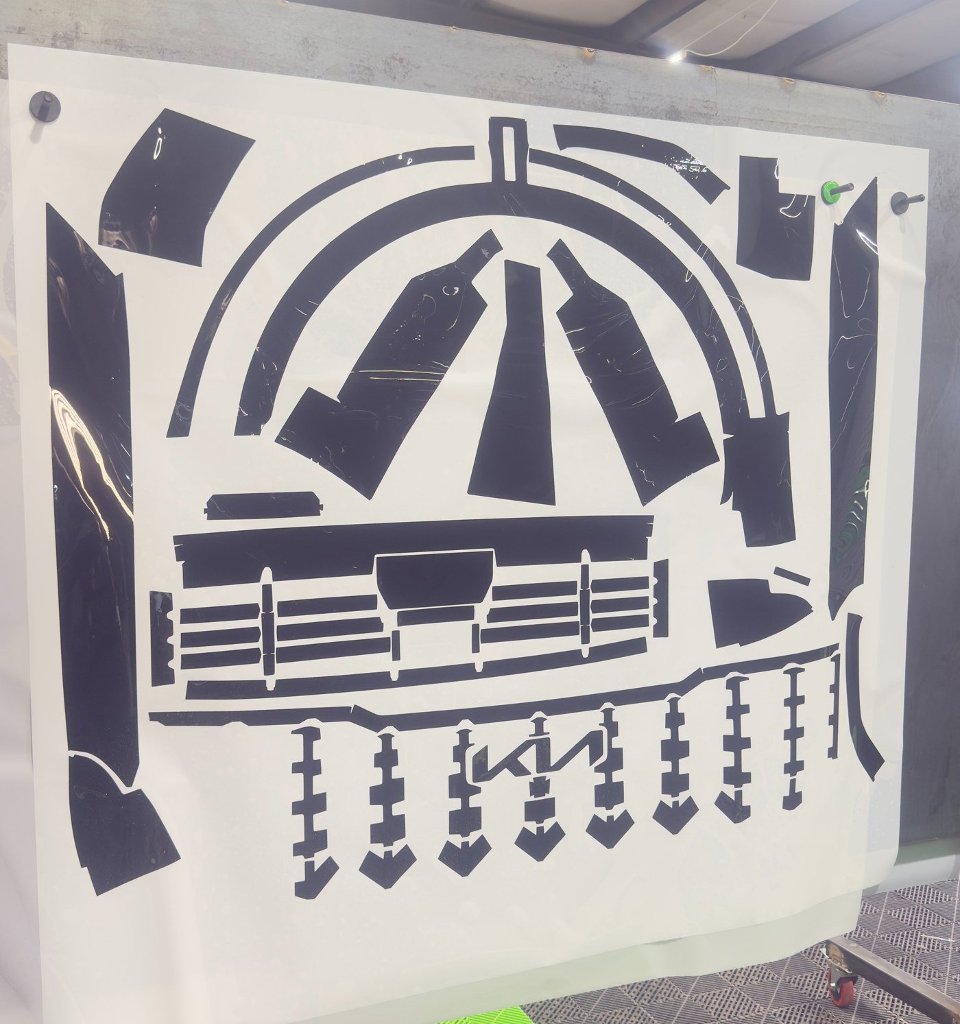 Computer-cut paint protection film pattern for a front end, cut on a Graphtec plotter at Elite Auto Spa